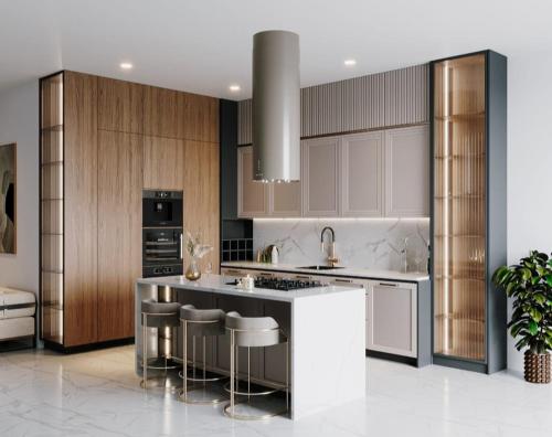 a kitchen with wooden cabinets and a island with bar stools at Vip Apartment Near Marriot in Mekhrably