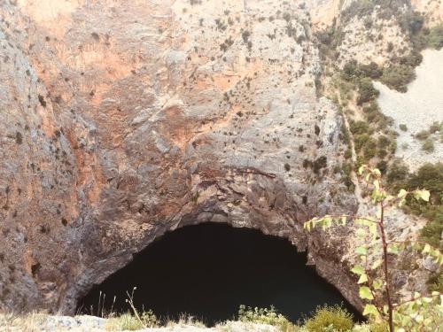 a cave in the side of a mountain at Hideaway Stonehouse pool for 2 Dalmatia Imotski in Medvidovići