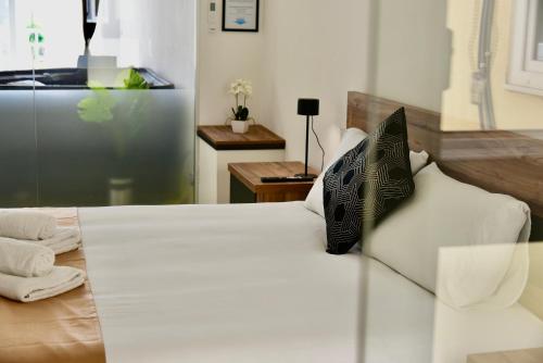 Η κουζίνα ή μικρή κουζίνα στο Alight Sauna & SPA Penthouse