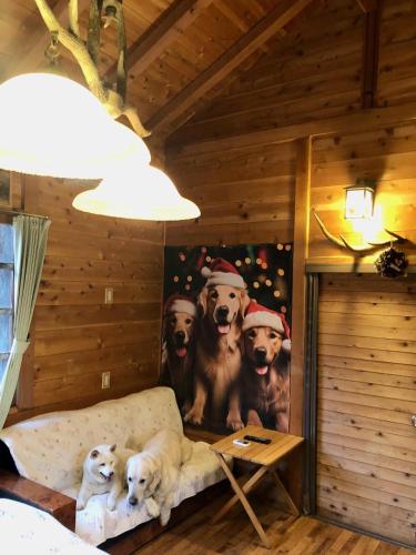 a group of dogs mural on the wall of a room at ドッグランドサムデイ in Minamitsuru
