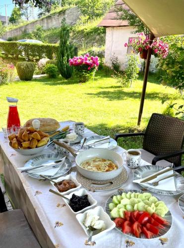 a table with plates of food on top of it at Plav`s dream in Plav