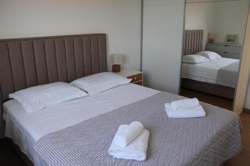 Katil atau katil-katil dalam bilik di Apartments Ivana