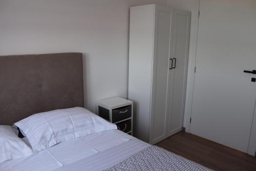 Katil atau katil-katil dalam bilik di Apartments Ivana