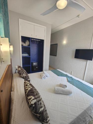 Кровать или кровати в номере Hotel Don Cándido