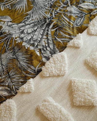 a close up of a cloth with feathers on it at Vila Gorila - Coastal Home in Porto Formoso