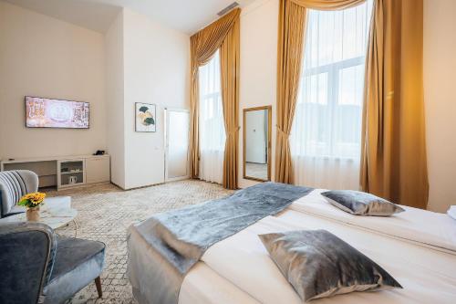 Postel nebo postele na pokoji v ubytování Sentir Hotel