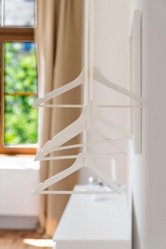 a white refrigerator with its door open in front of a window at 4BR Apartment - WIFI - NETFLIX - BUSINESS - ZENTRAL - KÜCHE in Wiesbaden