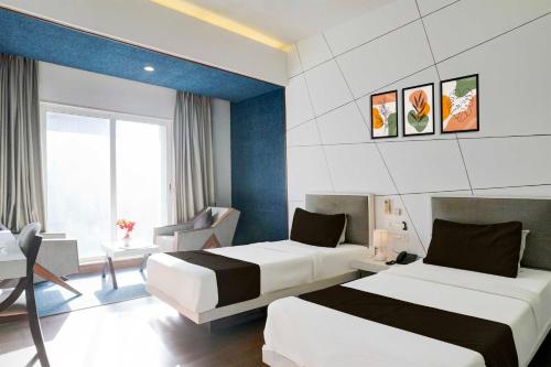 Una cama o camas en una habitación de Hotel O Limda Chowk
