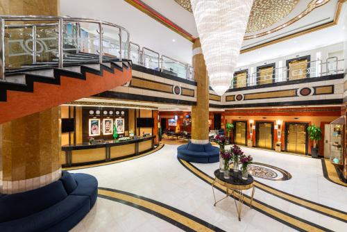 a view of the lobby of a shopping mall at Golden Tulip Al Shakreen in Al Madinah