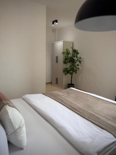 Ένα ή περισσότερα κρεβάτια σε δωμάτιο στο Vila One