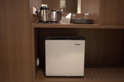 Kuchyň nebo kuchyňský kout v ubytování Hotel Sai Sanidhya