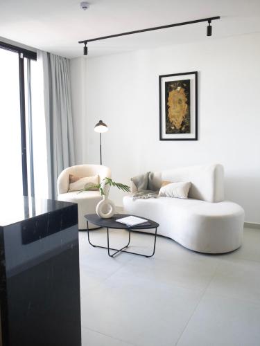 Zona de estar de Divina Tower Apart Hotel