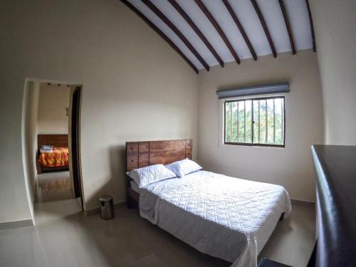 Katil atau katil-katil dalam bilik di Quimbaya Campestre Hotel