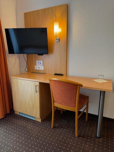 TV a/nebo společenská místnost v ubytování Gasthof Lamm Grabenstetten