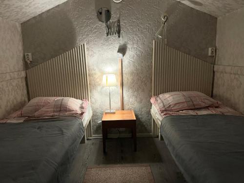 Postel nebo postele na pokoji v ubytování Hotel Teltta
