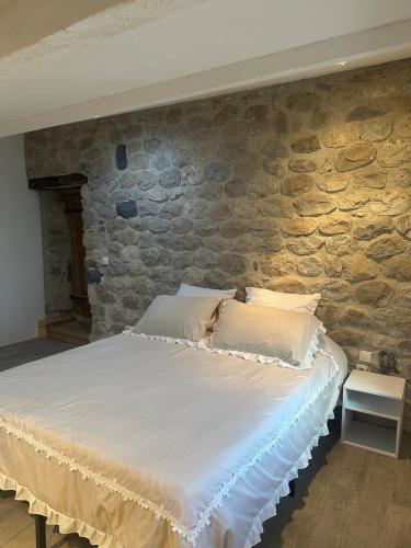 Cama o camas de una habitación en Gîte du Hameau