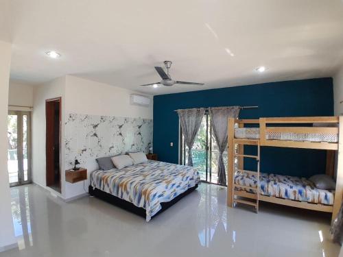 En eller flere senge i et værelse på Casa los fundadores 24 7 Security Private Pool Service Included