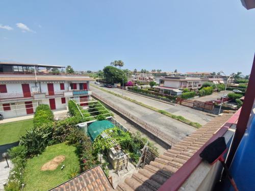 a view of a street from a building at Stone beach holiday home in Mascali