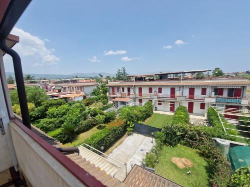 a view from the balcony of a building at Stone beach holiday home in Mascali
