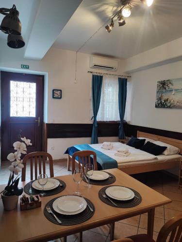 Ένα ή περισσότερα κρεβάτια σε δωμάτιο στο Arcobaleno Apartments