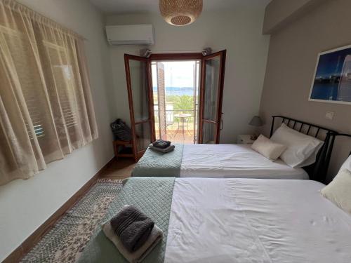 Ένα ή περισσότερα κρεβάτια σε δωμάτιο στο Villa Nova s.r Sea View