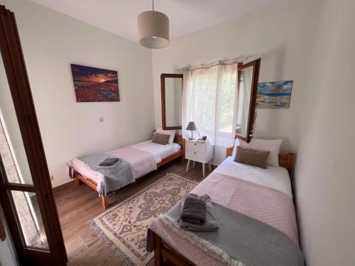 Ένα ή περισσότερα κρεβάτια σε δωμάτιο στο Villa Nova s.r Sea View