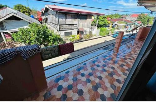 a view from the roof of a house with a tile floor at GL Siargao Fam Home w/ Starlink in General Luna
