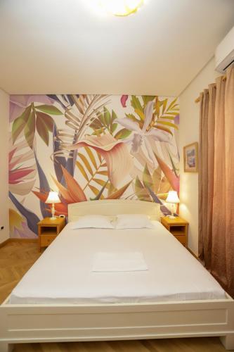 Ένα ή περισσότερα κρεβάτια σε δωμάτιο στο Le Palazzine Hotel