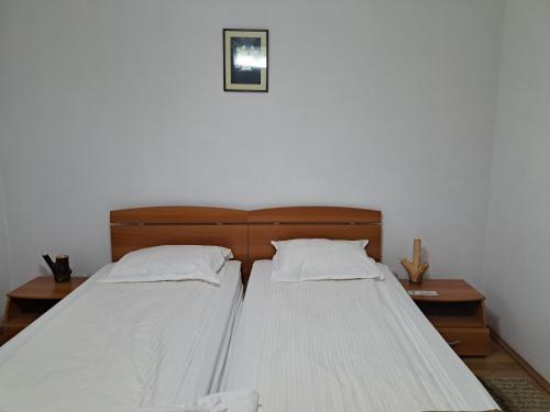 Katil atau katil-katil dalam bilik di Camere de inchiriat Cascada