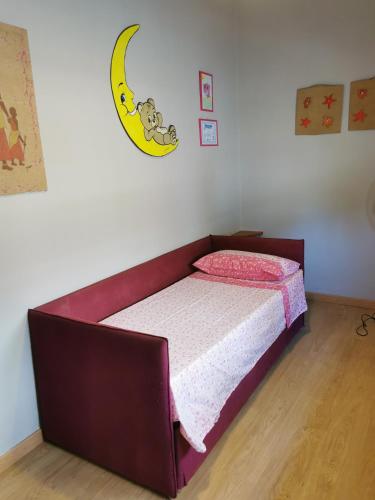 a bed in a bedroom with at Dimora La Fenice in Licola