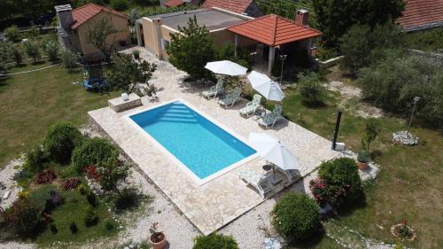 Holiday home Neva with private pool and game room