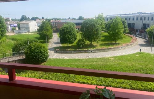 a view of a park from a balcony at Al B6 CLOSE TO VENICE in Mogliano Veneto