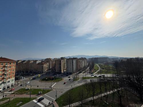 a view of a city with buildings and a street at B&b Bamby in Turin