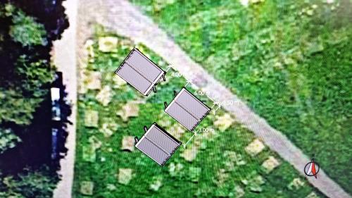 an overhead view of a park with four squares at Tinyhome Spielberg -Glamping Container in Flatschach