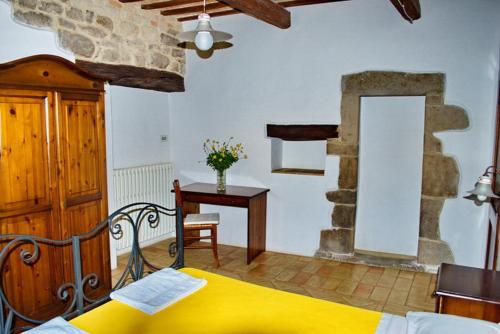 Postel nebo postele na pokoji v ubytování Agriturismo Elisei