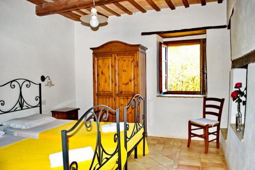 Postel nebo postele na pokoji v ubytování Agriturismo Elisei