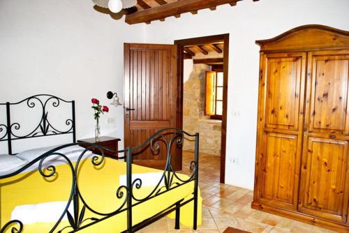 Postel nebo postele na pokoji v ubytování Agriturismo Elisei
