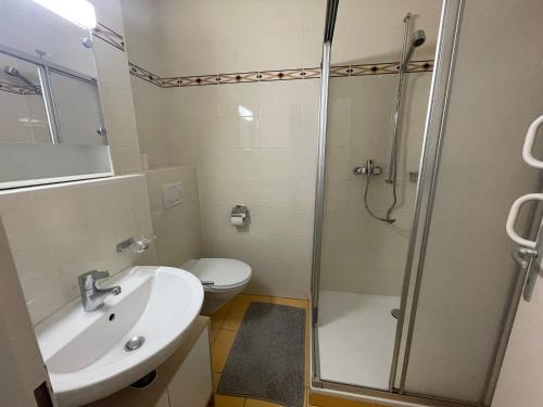 Ένα μπάνιο στο Appartement clame 6 minutes de la gare de Lausanne