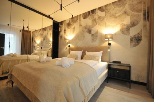 Katil atau katil-katil dalam bilik di Perła Mórz Apartament 75