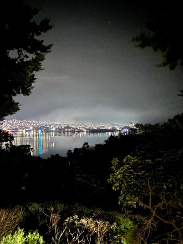 a view of a city and a body of water at Paradise of Atitlan in Santiago Atitlán