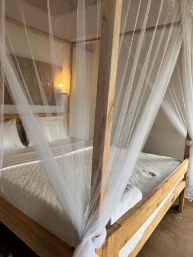 Una cama o camas en una habitación de Little Monkey Camp