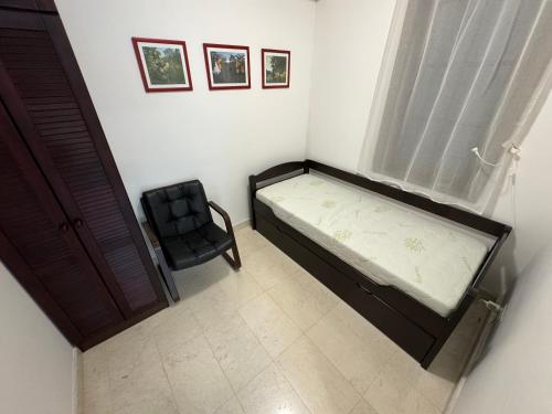 Кровать или кровати в номере Apartment CIELOMONTE, Boka Gardens
