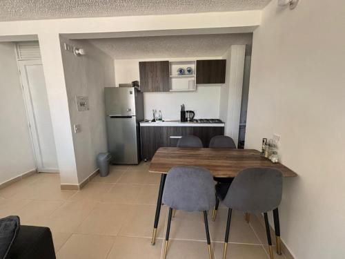 Kuchyň nebo kuchyňský kout v ubytování Hermoso Apartamento en Apulo