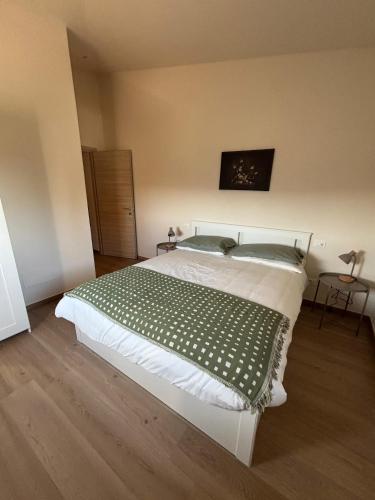 Postel nebo postele na pokoji v ubytování Villa Pieri Appartamento Blu