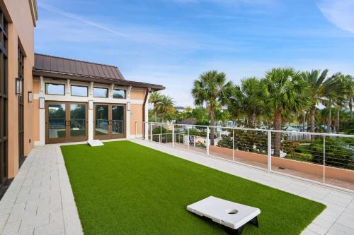 a large backyard with a green lawn at 2147 Cooper Bell in Kissimmee