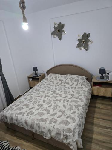 Una cama o camas en una habitación de Klaudija