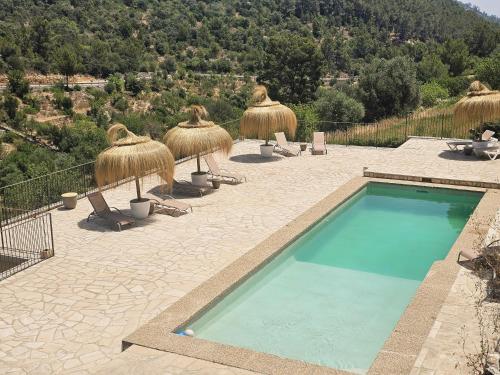Bazén v ubytování Agroturismo Finca Can Sec nebo v jeho okolí
