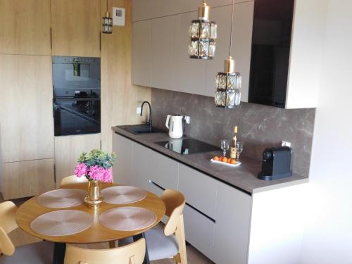Η κουζίνα ή μικρή κουζίνα στο Apartament Zielone Wzgórze 3