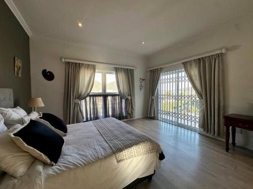 Voodi või voodid majutusasutuse 4 bedroom Villa 1 La Mer toas