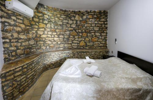 Cama o camas de una habitación en Hotel Ajka